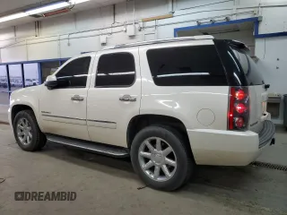 2014 GMC Yukon Denali with VIN 1GKS2EEF6ER141112, listed as a Copart auction lot 88526685 with 142,248 mi miles and Salvage Title. Bid and sale history available at carsss.com. Image 2.