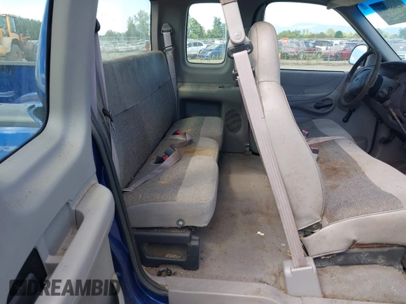 1998 Ford F-150 z VIN 2FTZX1727WCA77479, wystawiony jako IAAI lot #42685001 z przebiegiem 103 875 mil mil oraz . Historia ofert i sprzedaży dostępna na DreamBid. Obrazek 8.