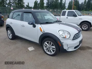 2014 MINI Countryman z VIN WMWZB3C5XEWR37594, wystawiony jako IAAI lot #42500466 z przebiegiem 67 589 mil mil oraz . Historia ofert i sprzedaży dostępna na DreamBid. Obrazek 1.