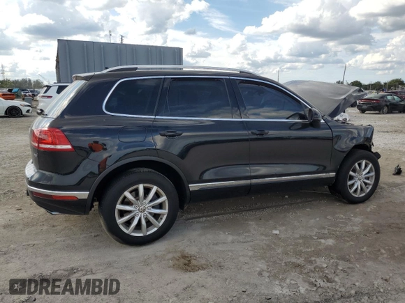 2017 Volkswagen Touareg Sport with VIN WVGEF7BP2HD000699, listed as a Copart auction lot 47234685 with Not Provided miles and Salvage Title. Bid and sale history available at DreamBid. Image 3.