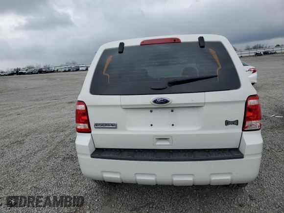 2011 Ford Escape XLS with VIN 1FMCU0C71BKB89898, listed as a Copart auction lot 52240445 with 180,201 mi miles and Salvage title. Bid and sale history available at DreamBid. Image 6.