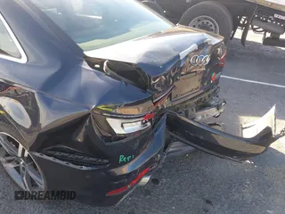 2018 Audi A4 Premium Plus z VIN WAUENAF41JN004776, wystawiony jako IAAI lot #41410230 z przebiegiem Nie podano mil oraz . Historia ofert i sprzedaży dostępna na DreamBid. Obrazek 17.