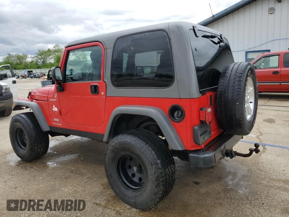 2005 Jeep Wrangler Sport z VIN 1J4FA49S75P317995, wystawiony jako Copart lot #58060055 z przebiegiem 189 332 mil mil oraz Szkoda całkowita • Salvage title. Historia ofert i sprzedaży dostępna na DreamBid. Obrazek 2.