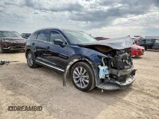 2023 Mazda CX-9 Carbon Edition with VIN JM3TCBDY1P0633964, listed as a Copart auction lot 60750015 with 34,657 mi miles and Salvage title. Bid and sale history available at DreamBid. Image 4.