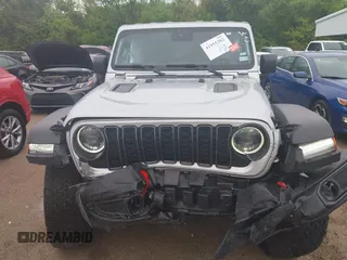 2024 Jeep Wrangler Rubicon with VIN 1C4PJXFG7RW252959, listed as a IAAI auction lot 41955302 with 27,727 mi miles and . Bid and sale history available at DreamBid. Image 12.