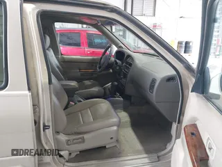 1999 Infiniti QX4 z VIN JNRAR05Y1XW049630, wystawiony jako IAAI lot #42296808 z przebiegiem 247 654 mil mil oraz . Historia ofert i sprzedaży dostępna na DreamBid. Obrazek 5.