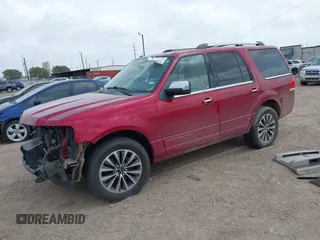 2015 Lincoln Navigator z VIN 5LMJJ2HT3FEJ07379, wystawiony jako IAAI lot #42032471 z przebiegiem 115 954 mil mil oraz . Historia ofert i sprzedaży dostępna na DreamBid. Obrazek 2.