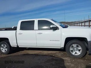 2017 Chevrolet Silverado 1500 LT with VIN 3GCUKREC5HG414935, listed as a IAAI auction lot 41064938 with 197,767 mi miles and . Bid and sale history available at DreamBid. Image 14.