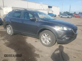 2015 Mazda CX-9 Touring z VIN JM3TB3CA2F0460970, wystawiony jako Copart lot #61544015 z przebiegiem 102 190 mil mil oraz Czysty tytuł • Clean title. Historia ofert i sprzedaży dostępna na DreamBid. Obrazek 4.