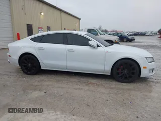 2014 Audi A7 Premium Plus z VIN WAUWGAFC0EN083417, wystawiony jako IAAI lot #41350273 z przebiegiem 163 402 mil mil oraz . Historia ofert i sprzedaży dostępna na DreamBid. Obrazek 13.