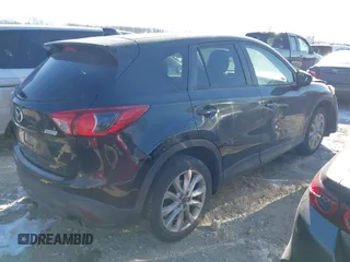 2013 Mazda CX-5 Grand Touring with VIN JM3KE2DE1D0164723, listed as a IAAI auction lot 41364590 with 227,932 mi miles. Bid and sale history available at carsss.com. Image 4.