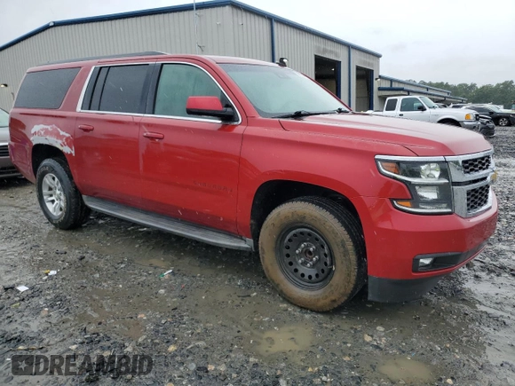 2015 Chevrolet Suburban LT with VIN 1GNSCJKC2FR306223, listed as a Copart auction lot 58733475 with 191,330 mi miles and Salvage title. Bid and sale history available at DreamBid. Image 4.
