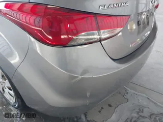 2012 Hyundai Elantra GLS PZEV with VIN KMHDH4AE5CU235756, listed as a IAAI auction lot 41312506 with 118,621 mi miles. Bid and sale history available at carsss.com. Image 6.