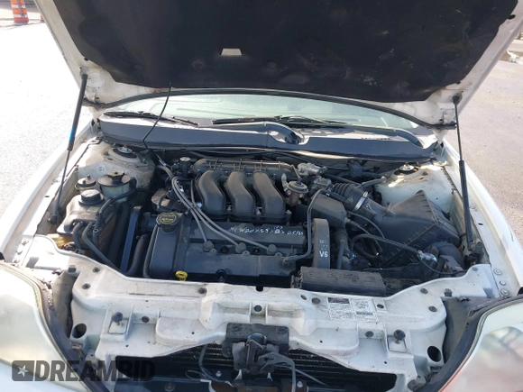 2002 Mercury Sable LS Premium with VIN 1MEFM55S62A618022, listed as a IAAI auction lot 41716388 with 275,327 mi miles and . Bid and sale history available at DreamBid. Image 10.