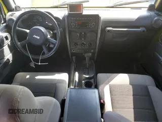 2008 Jeep Wrangler Unlimited X with VIN 1J4GA39118L528479, listed as a Copart auction lot 50953825 with 171,156 mi miles and Salvage Title. Bid and sale history available at carsss.com. Image 8.