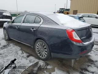2014 Lincoln MKS with VIN 1LNHL9EK0EG602349, listed as a Copart auction lot 45211525 with 51,616 mi miles and Salvage Title. Bid and sale history available at DreamBid. Image 2.