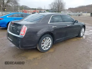 2013 Chrysler 300 C with VIN 2C3CCAKT2DH646633, listed as a IAAI auction lot 41719487 with 115,363 mi miles and . Bid and sale history available at DreamBid. Image 4.