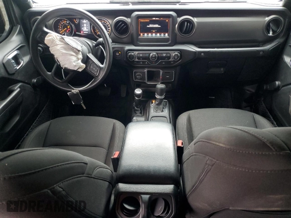 2023 Jeep Gladiator Freedom with VIN 1C6JJTAG9PL557861, listed as a Copart auction lot 50452955 with 44,716 mi miles and Salvage title. Bid and sale history available at DreamBid. Image 8.