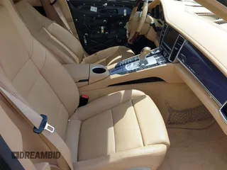 2013 Porsche Panamera 4S z VIN WP0AB2A71DL061108, wystawiony jako IAAI lot #42063281 z przebiegiem 90 100 mil mil oraz . Historia ofert i sprzedaży dostępna na DreamBid. Obrazek 5.
