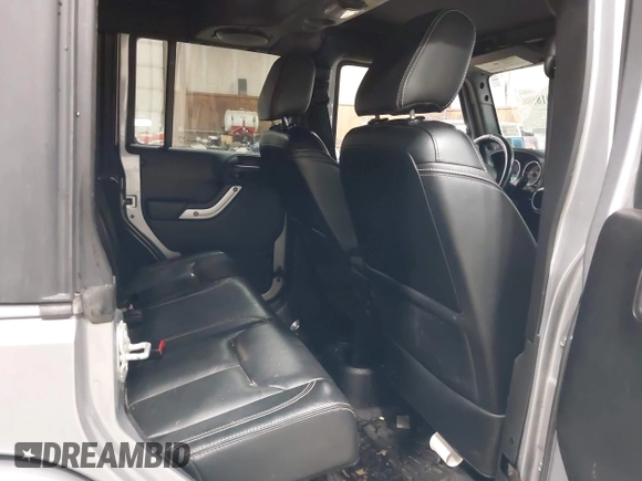 2014 Jeep Wrangler Unlimited Sahara with VIN 1C4BJWEG5EL164350, listed as a IAAI auction lot 42018586 with 113,222 mi miles. Bid and sale history available at carsss.com. Image 8.