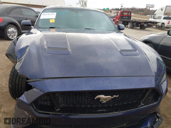2018 Ford Mustang GT z VIN 1FA6P8CF0J5128561, wystawiony jako IAAI lot #41078319 z przebiegiem 72 615 mil mil oraz . Historia ofert i sprzedaży dostępna na DreamBid. Obrazek 12.