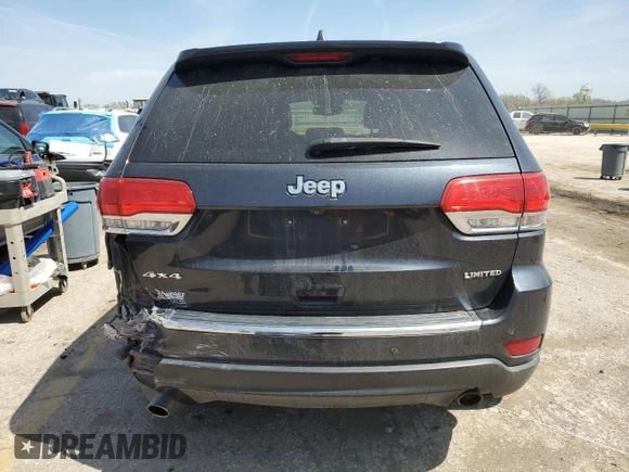 2014 Jeep Grand Cherokee Limited with VIN 1C4RJFBG4EC265947, listed as a Copart auction lot 52448155 with 127,700 mi miles and Salvage title. Bid and sale history available at DreamBid. Image 6.