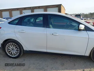 2013 Ford Focus Titanium with VIN 1FADP3J22DL167324, listed as a IAAI auction lot 41616927 with 127,259 mi miles and . Bid and sale history available at carsss.com. Image 13.