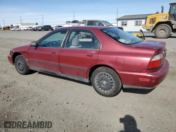 1996 Honda Accord LX with VIN 1HGCD563XTA266206, listed as a Copart auction lot 48601005 with 302,329 mi miles and Salvage Title. Bid and sale history available at DreamBid. Image 2.