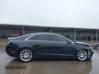 2015 Lincoln MKZ z VIN 3LN6L2G90FR621891, wystawiony jako IAAI lot #41968088 z przebiegiem 128 988 mil mil oraz . Historia ofert i sprzedaży dostępna na DreamBid. Obrazek 14.