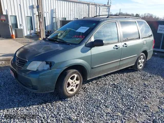 2000 Mazda MPV DX with VIN JM3LW28G0Y0154963, listed as a IAAI auction lot 41446402 with 219,262 mi miles. Bid and sale history available at carsss.com. Image 2.