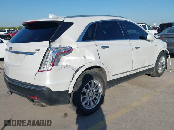 2018 Cadillac XT5 Luxury FWD z VIN 1GYKNCRS3JZ143354, wystawiony jako IAAI lot #41973536 z przebiegiem 101 327 mil mil oraz . Historia ofert i sprzedaży dostępna na DreamBid. Obrazek 4.