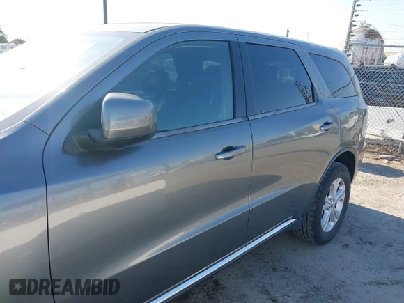 2012 Dodge Durango SXT with VIN 1C4RDJAG2CC271772, listed as a IAAI auction lot 42760810 with 151,215 mi miles and . Bid and sale history available at DreamBid. Image 14.