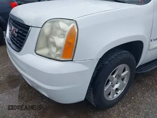 2009 GMC Yukon SLT w/4SA with VIN 1GKFK33049R153415, listed as a IAAI auction lot 41896770 with 182,256 mi miles. Bid and sale history available at carsss.com. Image 6.