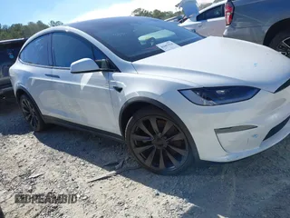 2023 Tesla Model X with VIN 7SAXCDE54PF430808, listed as a IAAI auction lot 41667924 with 21,100 mi miles and . Bid and sale history available at DreamBid. Image 1.