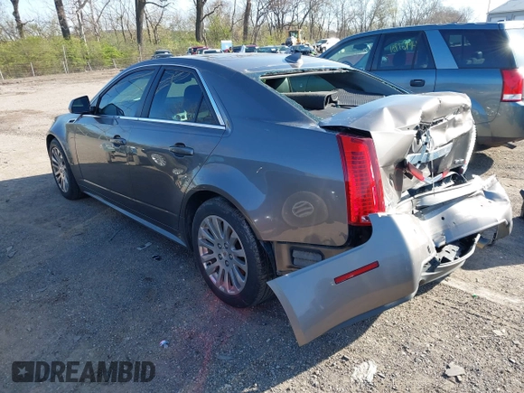 2012 Cadillac CTS Premium with VIN 1G6DS5E3XC0128264, listed as a IAAI auction lot 41964295 with 117,889 mi miles and . Bid and sale history available at DreamBid. Image 3.