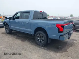2023 Ford F-150 Lightning Pro with VIN 1FT6W1EVXPWG53591, listed as a IAAI auction lot 42249385 with 17,892 mi miles and . Bid and sale history available at DreamBid. Image 3.