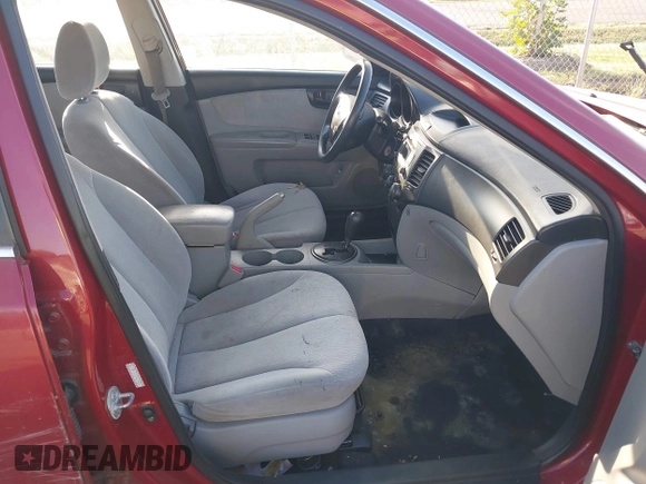 2009 Kia Optima LX z VIN KNAGE228995289603, wystawiony jako IAAI lot #40716738 z przebiegiem 209 904 mil mil oraz . Historia ofert i sprzedaży dostępna na DreamBid. Obrazek 5.