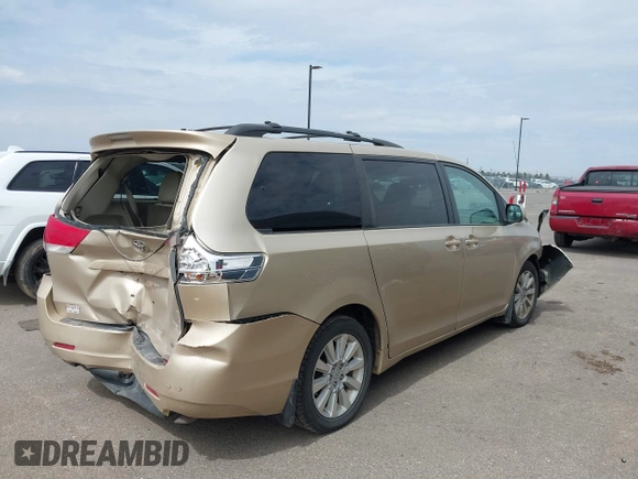 2013 Toyota Sienna XLE with VIN 5TDDK3DC4DS055796, listed as a IAAI auction lot 41993530 with 256,735 mi miles and . Bid and sale history available at DreamBid. Image 4.