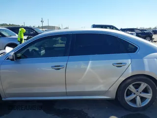 2013 Volkswagen Passat SE w/Sunroof with VIN 1VWBH7A34DC003147, listed as a IAAI auction lot 41662970 with 153,897 mi miles. Bid and sale history available at carsss.com. Image 14.