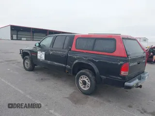2001 Dodge Dakota Sport with VIN 1B7HG2AN31S225393, listed as a IAAI auction lot 42183298 with 244,961 mi miles and . Bid and sale history available at carsss.com. Image 3.