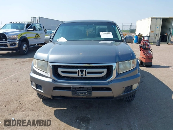 2009 Honda Ridgeline RTS z VIN 5FPYK16479B107114, wystawiony jako IAAI lot #42452199 z przebiegiem 206 853 mil mil oraz . Historia ofert i sprzedaży dostępna na DreamBid. Obrazek 12.