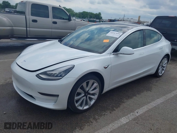 2020 Tesla Model 3 Standard Range Plus z VIN 5YJ3E1EA9LF598682, wystawiony jako IAAI lot #42247434 z przebiegiem 28 835 mil mil oraz . Historia ofert i sprzedaży dostępna na DreamBid. Obrazek 2.