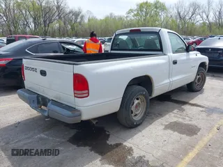 2001 Dodge Dakota with VIN 1B7FL26XX1S249462, listed as a IAAI auction lot 42003993 with 228,398 mi miles. Bid and sale history available at carsss.com. Image 4.
