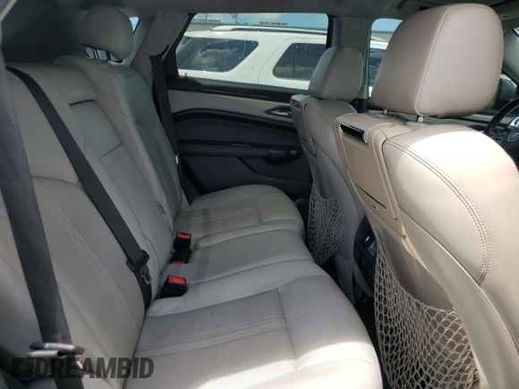 2014 Cadillac SRX Premium Collection z VIN 3GYFNGE30ES627895, wystawiony jako Copart lot #58605985 z przebiegiem 49 300 mil mil oraz Szkoda całkowita • Salvage title. Historia ofert i sprzedaży dostępna na DreamBid. Obrazek 11.
