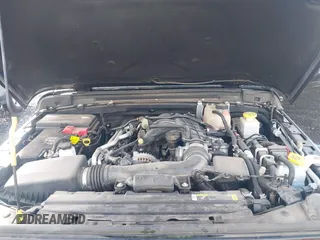 2023 Jeep Gladiator High Altitude z VIN 1C6HJTFG0PL504618, wystawiony jako IAAI lot #41877983 z przebiegiem 26 402 mil mil oraz . Historia ofert i sprzedaży dostępna na DreamBid. Obrazek 10.