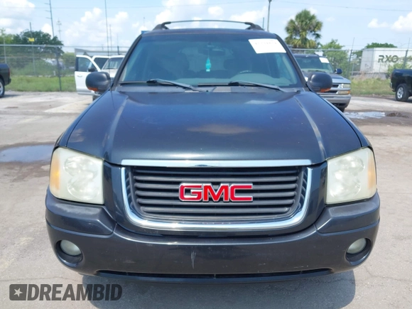 2003 GMC Envoy SLT with VIN 1GKES16S536169306, listed as a IAAI auction lot 42234834 with 239,144 mi miles and . Bid and sale history available at DreamBid. Image 6.