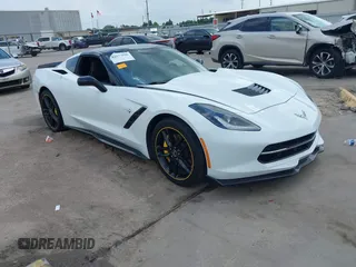2015 Chevrolet Corvette Z51 2LT z VIN 1G1YK2D76F5123841, wystawiony jako IAAI lot #42377638 z przebiegiem 96 778 mil mil oraz . Historia ofert i sprzedaży dostępna na DreamBid. Obrazek 1.