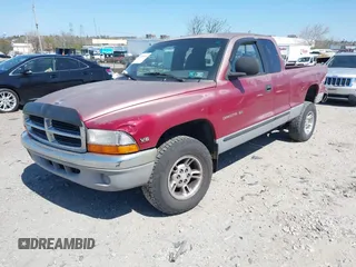 1999 Dodge Dakota SLT z VIN 1B7GL22X2XS222162, wystawiony jako IAAI lot #42038943 z przebiegiem 222 883 mil mil oraz . Historia ofert i sprzedaży dostępna na DreamBid. Obrazek 16.