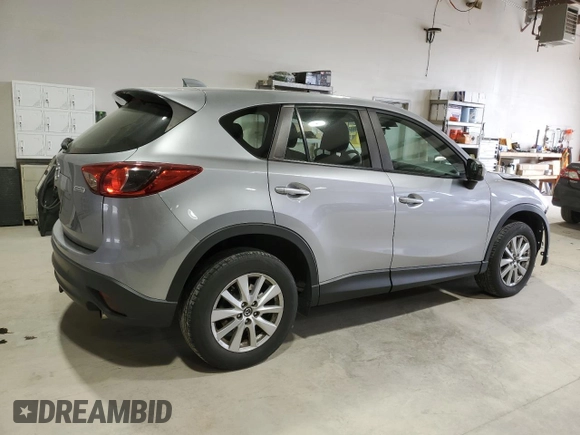 2014 Mazda CX-5 Sport with VIN JM3KE4BE4E0419882, listed as a Copart auction lot 53896815 with 127,428 mi miles and Salvage Title. Bid and sale history available at carsss.com. Image 3.