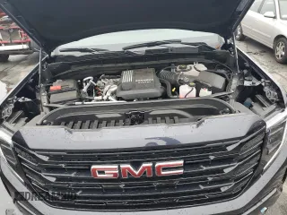2023 GMC Sierra 1500 with VIN 1GTVUCE82PZ327869, listed as a Copart auction lot 83739534 with 10,440 mi miles and Salvage Title. Bid and sale history available at DreamBid. Image 11.